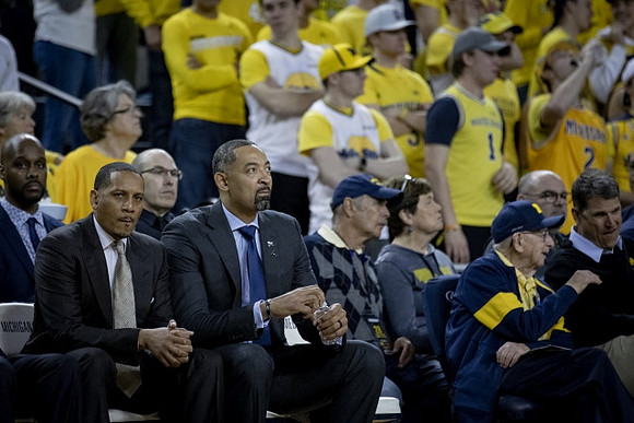 Howard Eisley, Jim Harbaugh, and Jim Harbaugh