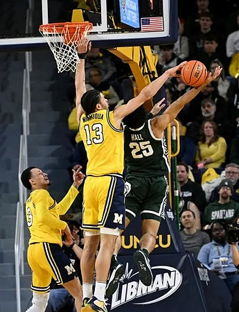Jaelin Llewellyn (3) and Olivier Nkamhoua (13)