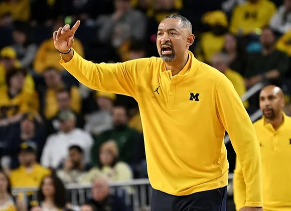 Juwan Howard and Saddi Washington