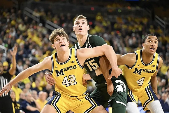 Will Tschetter (42) and Nimari Burnett (4)