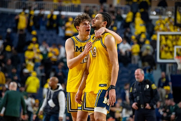 Will Tschetter (42) and Olivier Nkamhoua (13)