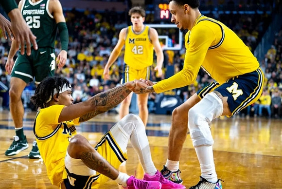 Dug McDaniel (0), Will Tschetter (42), and Jaelin Llewellyn (3)