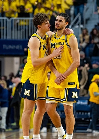 Will Tschetter (42) and Olivier Nkamhoua (13)