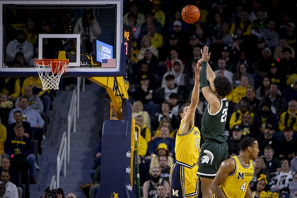 Olivier Nkamhoua (13) and Nimari Burnett (4)
