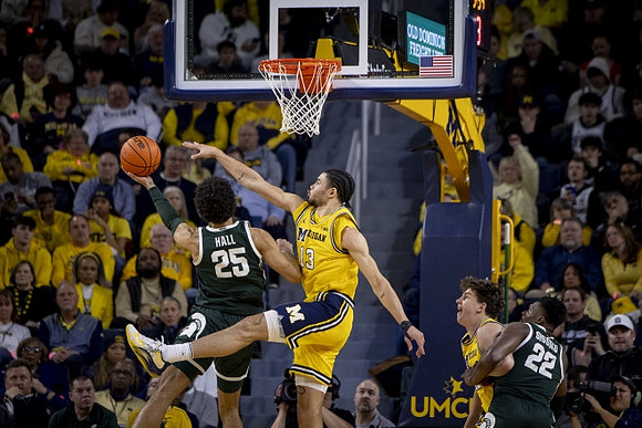 Olivier Nkamhoua (13) and Will Tschetter (42)