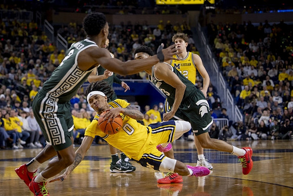 Dug McDaniel (0) and Will Tschetter (42)