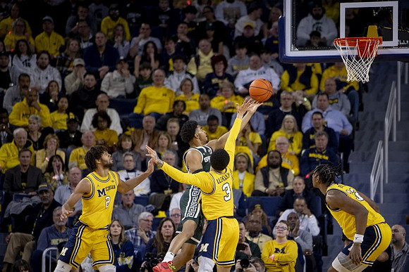 Tray Jackson (2), Jaelin Llewellyn (3), and Tarris Reed Jr. (32)