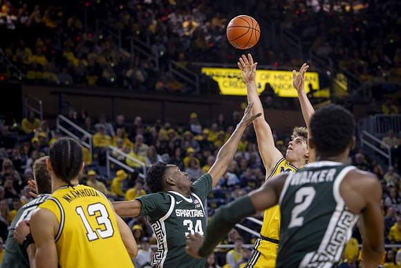 Olivier Nkamhoua (13) and Will Tschetter (42)