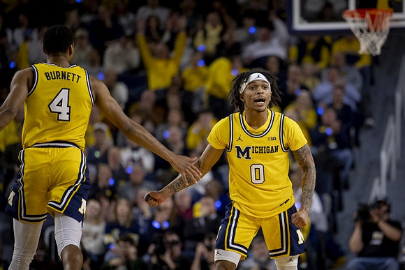 Nimari Burnett (4) and Dug McDaniel (0)
