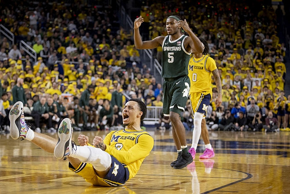 Jaelin Llewellyn (3) and Dug McDaniel (0)