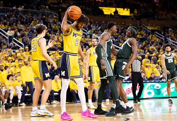 Will Tschetter (42), Tray Jackson (2), and Olivier Nkamhoua (13)