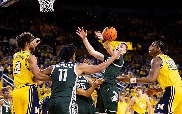 Tray Jackson (2), Will Tschetter (42), and Tarris Reed Jr. (32)