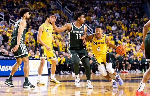 Olivier Nkamhoua (13) and Nimari Burnett (4)