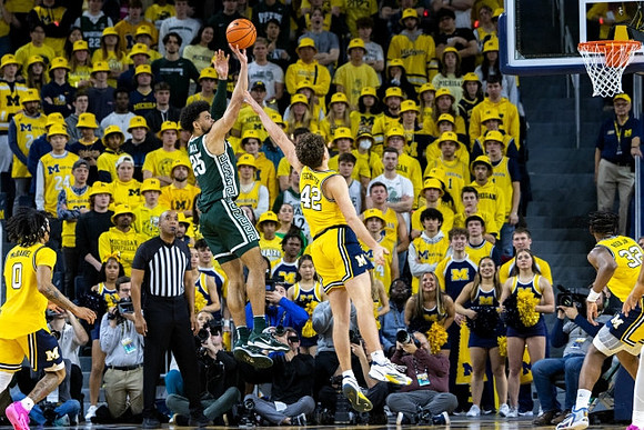 Dug McDaniel (0), Will Tschetter (42), and Tarris Reed Jr. (32)