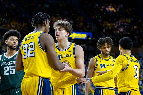 Tarris Reed Jr. (32), Will Tschetter (42), Tray Jackson (2), and Jaelin Llewellyn (3)