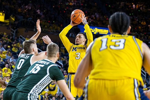 Jaelin Llewellyn (3) and Olivier Nkamhoua (13)
