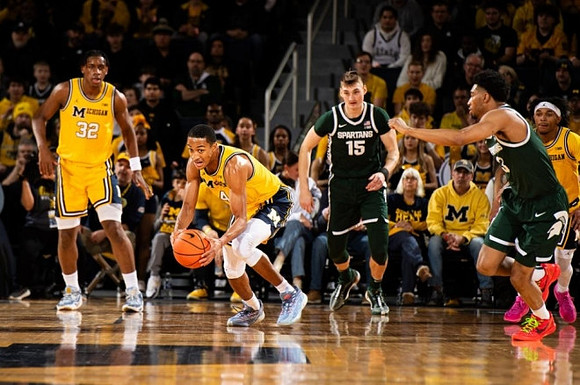 Tarris Reed Jr. (32), Nimari Burnett (4), and Dug McDaniel (0)