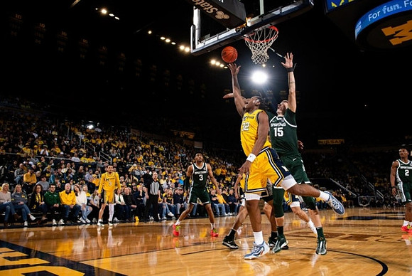 Jaelin Llewellyn (3) and Tarris Reed Jr. (32)