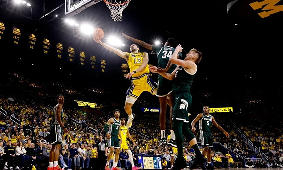 Tray Jackson (2) and Olivier Nkamhoua (13)