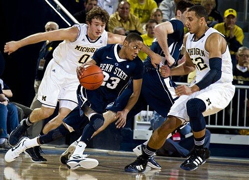 Zack Novak (0) and Jordan Morgan (52)