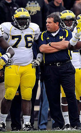 Quinton Washington (76) and Brady Hoke