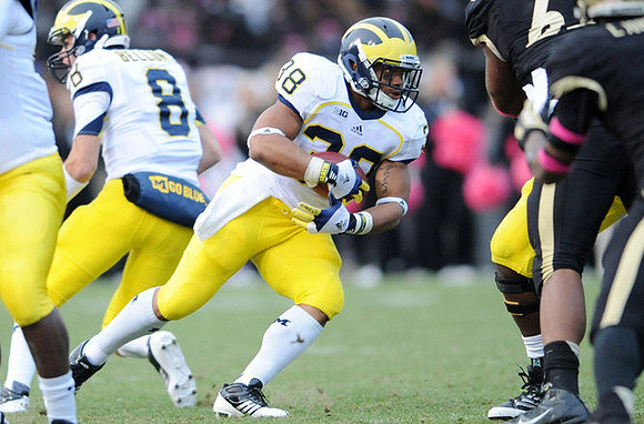 Russell Bellomy (8) and Thomas Rawls (38)
