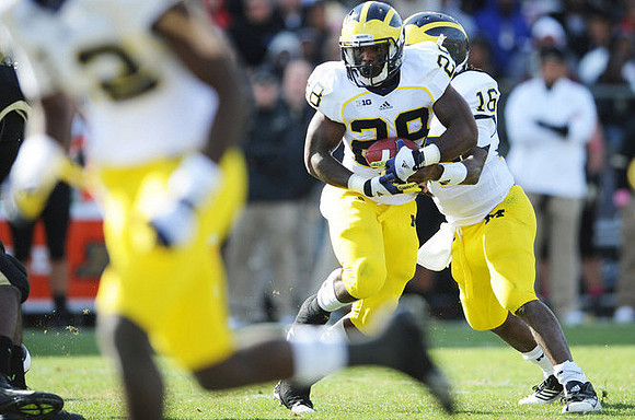 Fitzgerald Toussaint (28), Denard Robinson (16), and Devin Gardner (12)