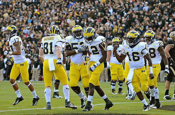 Jeremy Jackson (17), Mike Kwiatkowski (81), Ricky Barnum (52), Devin Gardner (12), Elliott Mealer (57), Denard Robinson (16), and Fitzgerald Toussaint (28)