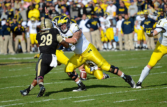 Brendan Gibbons (34), Drew Dileo (9), Taylor Lewan (77) and Mike Kwiatkowski (81)