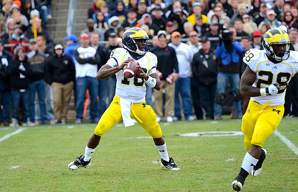 Denard Robinson (16) and Fitzgerald Toussaint (28)