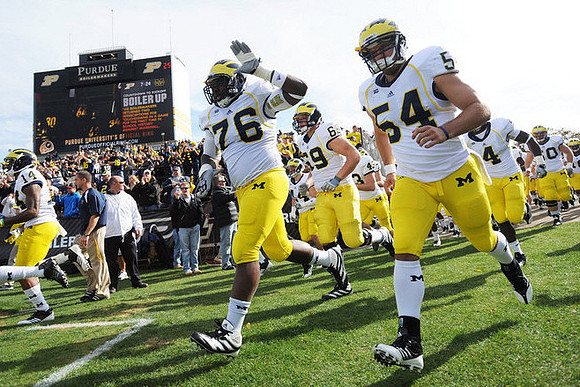 Josh Furman (14), Quinton Washington (76), Erik Gunderson (69), Will Hagerup (43), Jareth Glanda (54), and Cameron Gordon (4)
