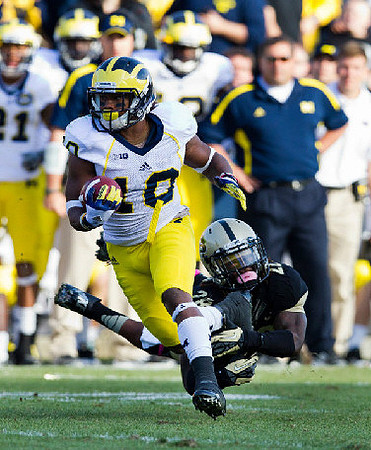 Jeremy Gallon (10) and Brady Hoke