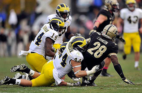Josh Furman (14), Brandin Hawthorne (7), Desmond Morgan (44), and Will Hagerup (43)
