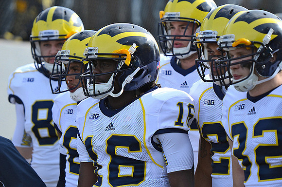 Denard Robinson (16) and Jordan Kovacs (32)