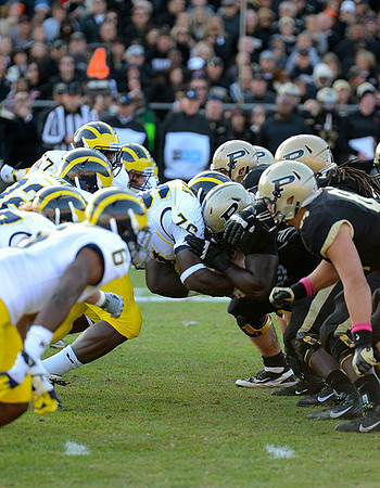 Raymon Taylor (6), Quinton Washington (76), and Frank Clark (57)