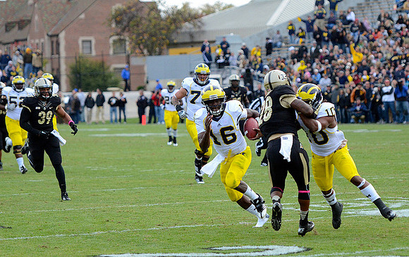 Ricky Barnum (52), Fitzgerald Toussaint (28), Michael Schofield (75), Denard Robinson (16) , and Jeremy Gallon (10)