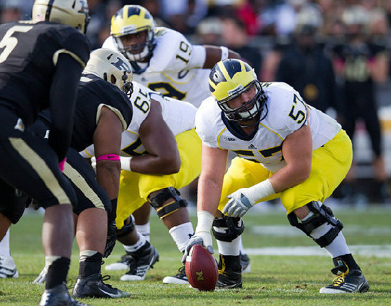 Elliott Mealer (57), Patrick Omameh (65), and Devin Funchess (19)