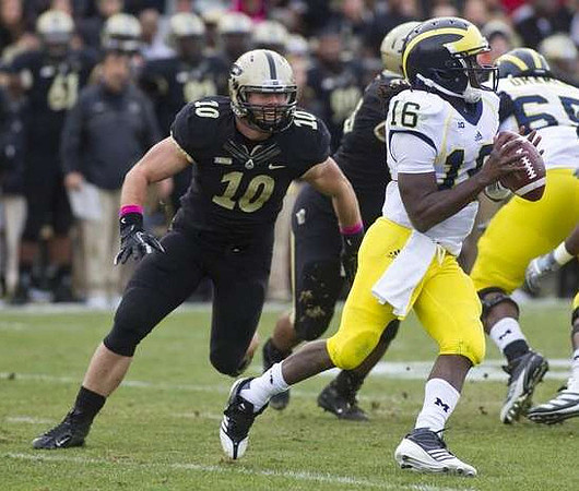 Denard Robinson (16) and Patrick Omameh (65)