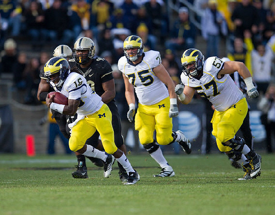 Denard Robinson (16), Michael Schofield (75), and Elliott Mealer (57)