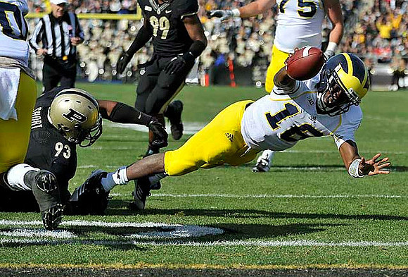 Denard Robinson (16)