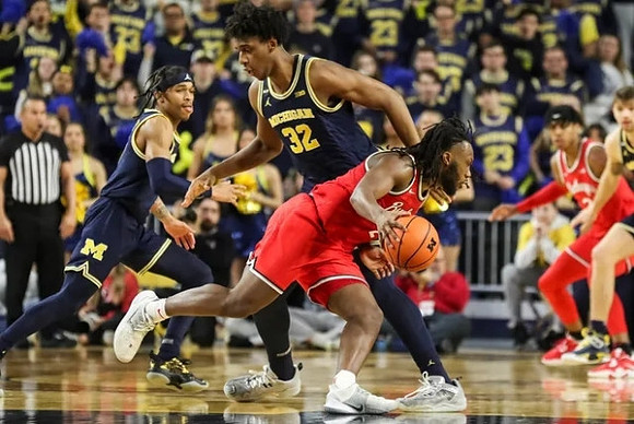 Dug McDaniel (0) and Tarris Reed Jr. (32)