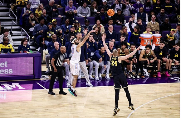Youssef Khayat (24) and Juwan Howard
