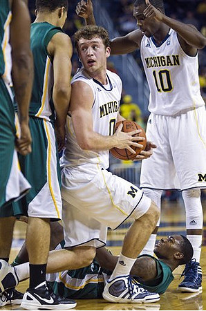 Zack Novak (0) and Tim Hardaway Jr. (10)