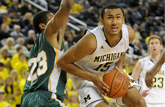 Jon Horford (15) and Evan Smotrycz (23)