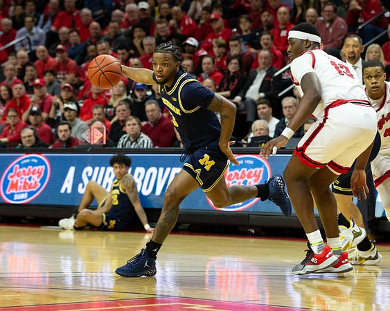 Zavier Simpson (3) and Eli Brooks (55)