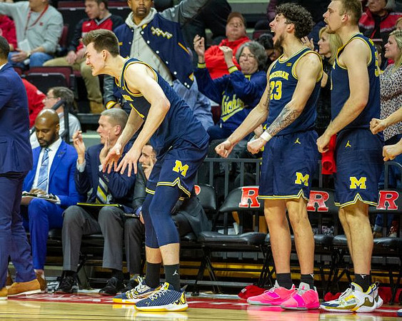 Colin Castleton (11), Brandon Johns Jr. (23), and Austin Davis (51)
