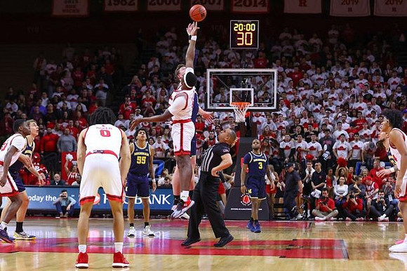 Franz Wagner (21), Eli Brooks (55), Jon Teske (15), and Zavier Simpson (3)