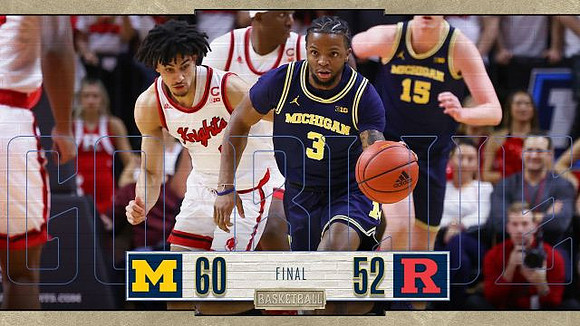 Zavier Simpson (3) and Jon Teske (15)