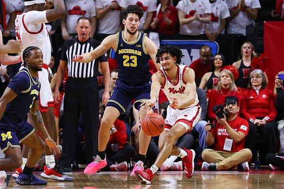 Zavier Simpson (3) and Brandon Johns Jr. (23)