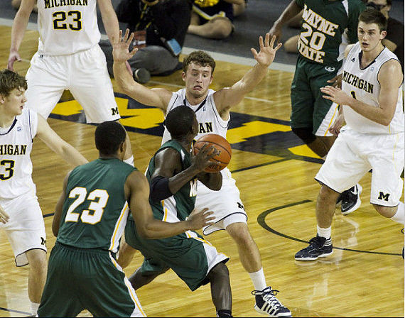 Matt Vogrich (13), Evan Smotrycz (23), Zack Novak (0), and Stu Douglass (1)